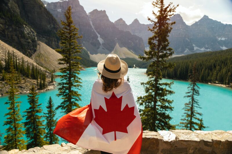 Summer 2021: Woman draped in Canadian Flag