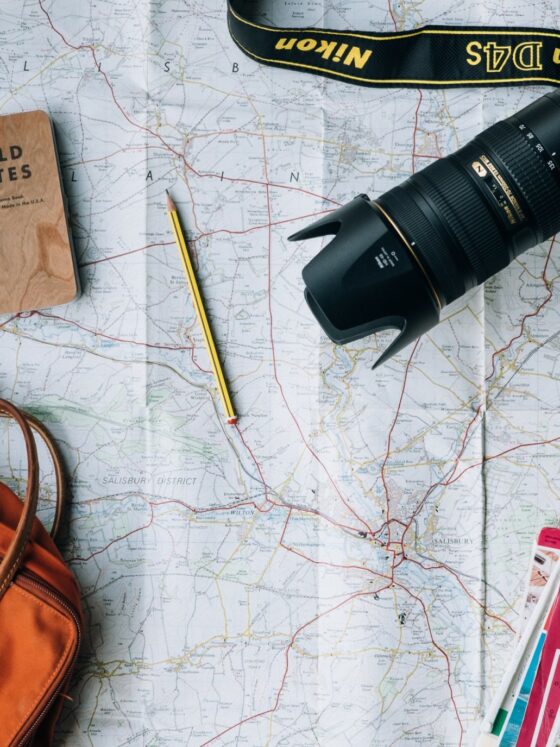 Ideal Vacation: Travel Map, Camera, Bag and notebook