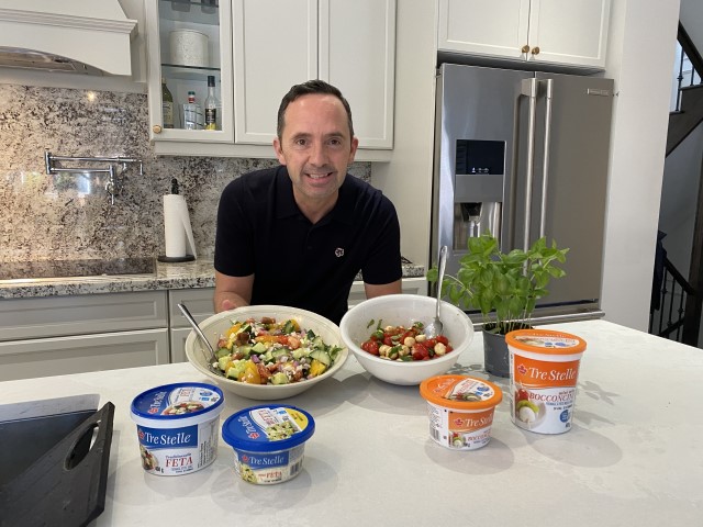 Easy Recipes: Frank Ferragine posing with salad bowls and ingredients