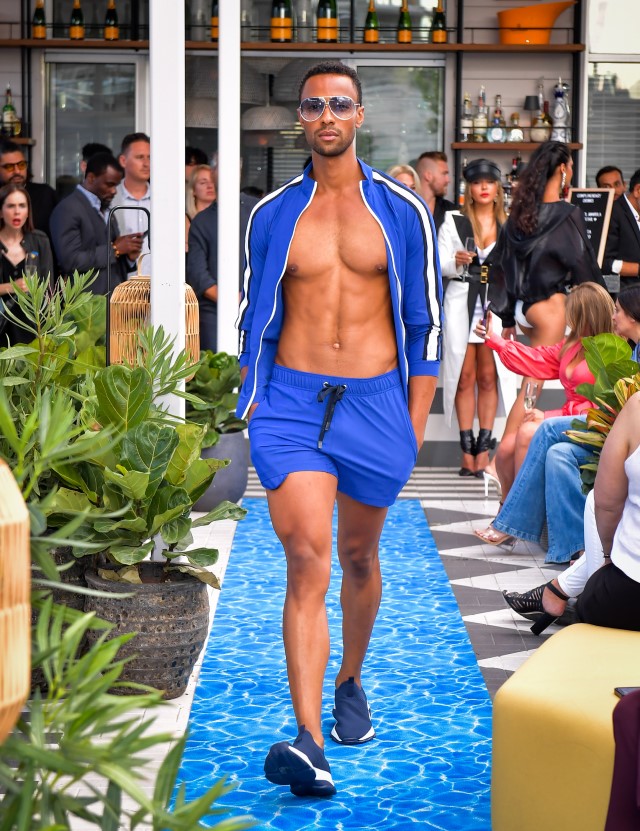 Shan Swimwear: Male Model in Swimtrunks and jacket