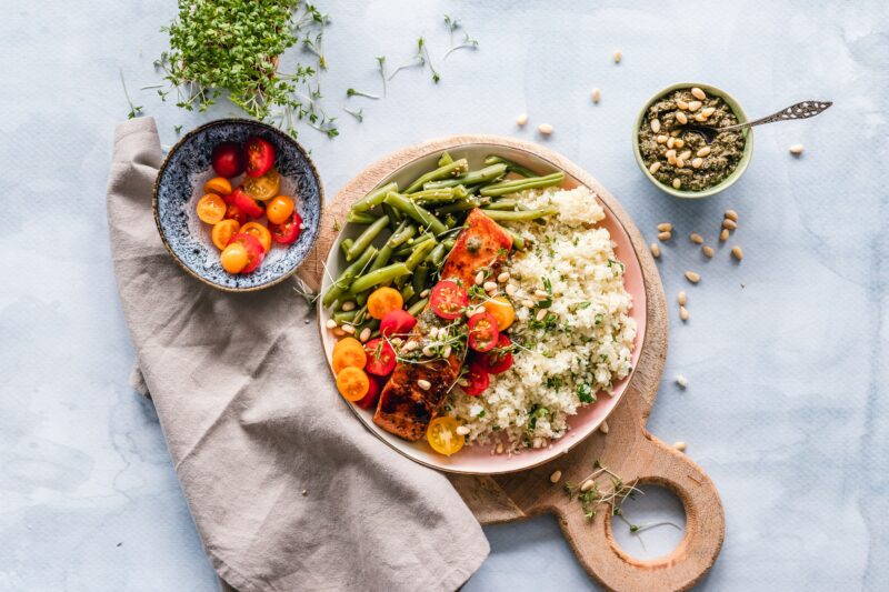 Best vitamins: Bowls of tomatoes, pumpkin seeds and rice and green beans