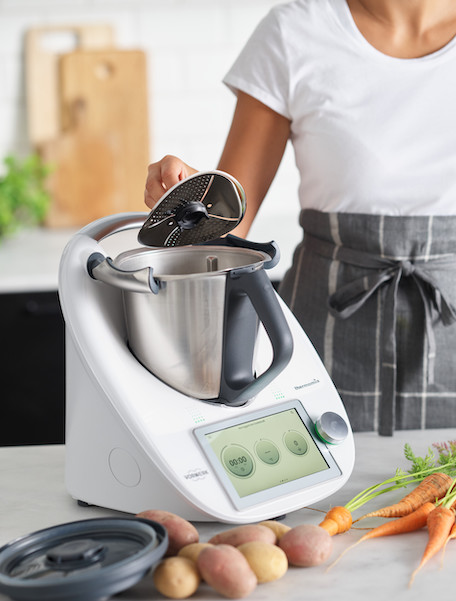 Items for the kitchen: Thermomix on counter with carrots and potatoes