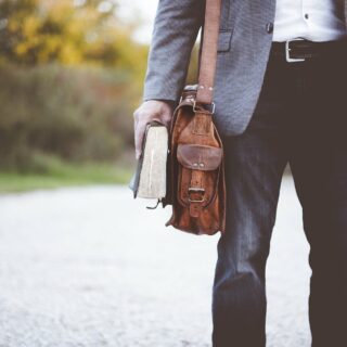 Sport jacket: Man in sport jacket with book bag