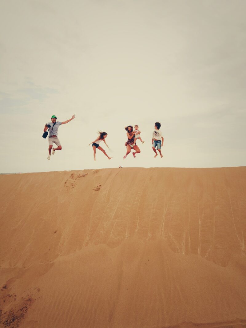 Family Vacation: Family in sand dunes