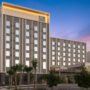 AC Hotel Miami Dadeland; Exterior of hotel in the evening