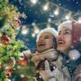 Holiday Photos: Mother and Daughter in front of an outdoor Christmas Tree