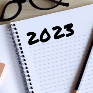 Managing New Year's Resolutions: Notepad with 2023