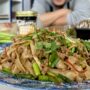 Black Garlic Turkey Noodles: Dish with Nick Liu in the background