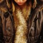 Jacket Material: woman in a brown polyester jacket