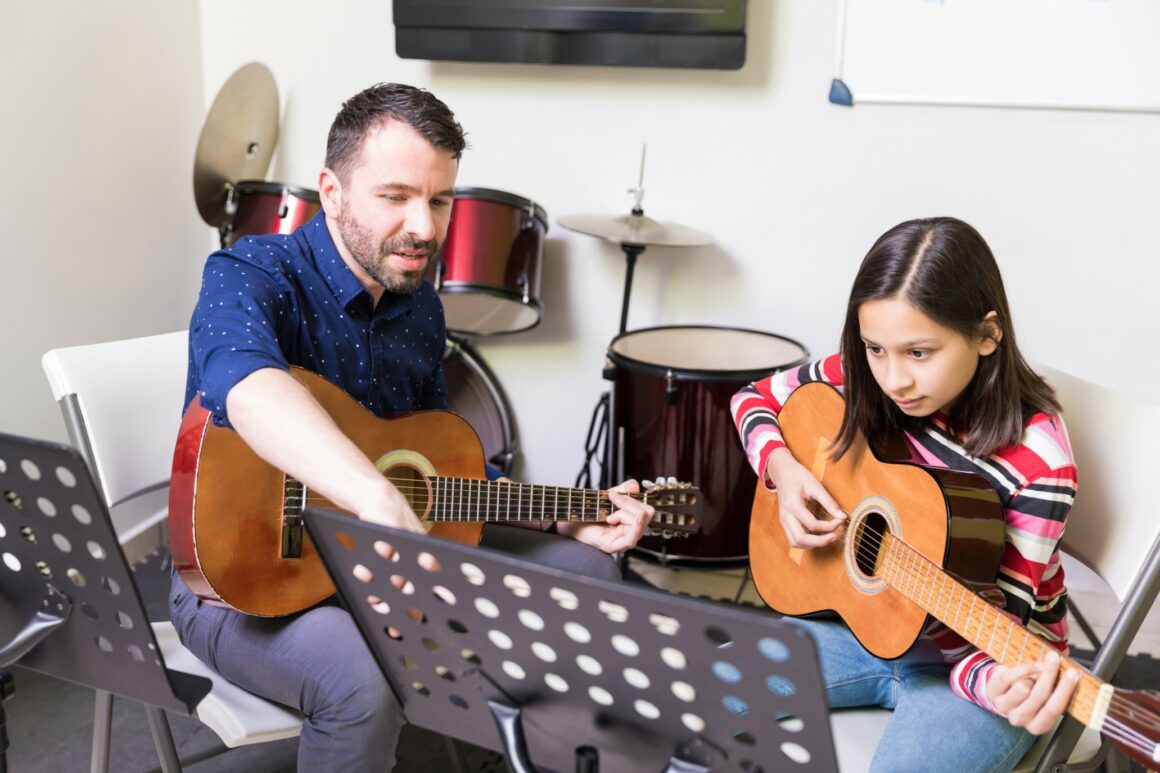 The Benefits of Teaching Your Child to Play a Musical Instrument - Vimarsana News
