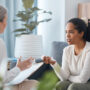 Women's Health: Woman speaking to her doctor