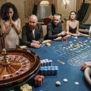 Dress Codes: People in formalwear at a roulette table