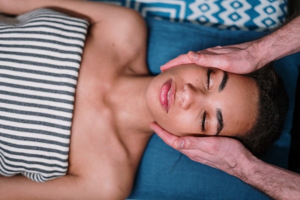 healthier-looking skin: woman having a face massage