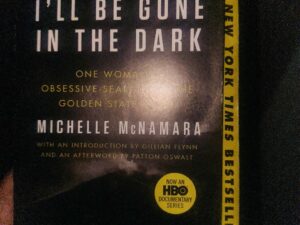 I'll Be Gone in the Dark: Photo of book in the dark