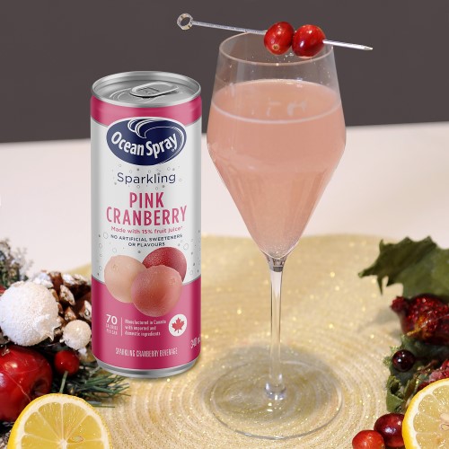 Cranberry Cocktails and Mocktails: Pink Cranberry Kiss Cocktail next to a can of Ocean Spray