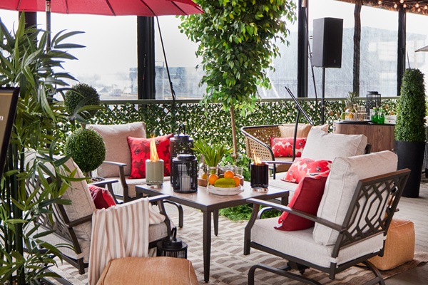 Patio Furniture: Set of 4 chairs with red pillows and table set up with drinks