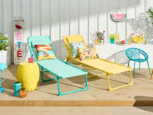 Patio Furniture: two loungers and assorted, brightly coloured furniture