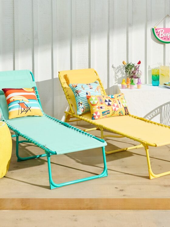 Patio Furniture: two loungers and assorted, brightly coloured furniture
