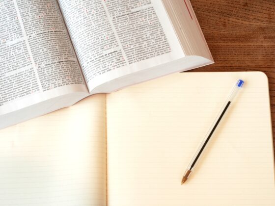 online gambling: law book and notepad with pen