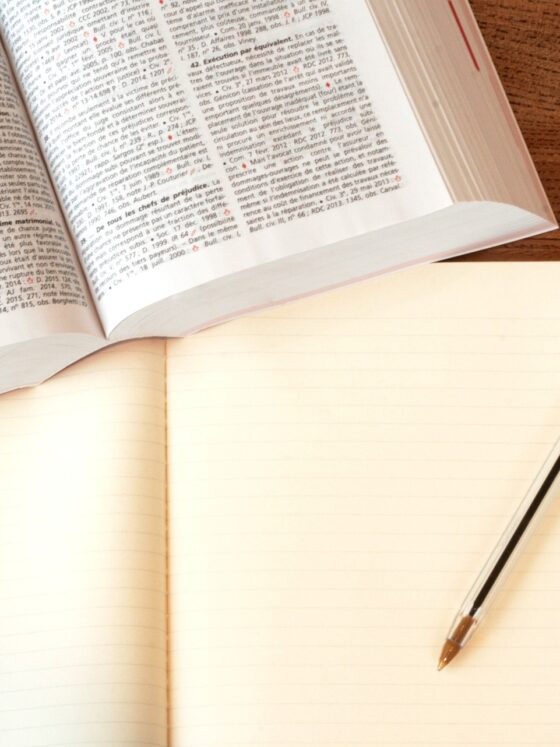 online gambling: law book and notepad with pen