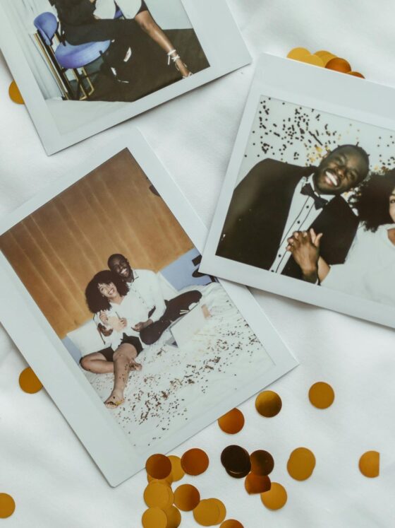 Wedding Photography: Polaroids of a bride and groom set against a white background with gold confetti