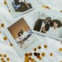 Wedding Photography: Polaroids of a bride and groom set against a white background with gold confetti