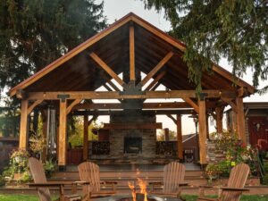 Wood Staining: Wooden patio with Muskoka Chairs around a fire pit