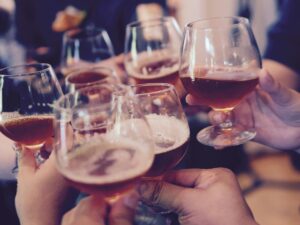 Sundowner: People cheering at a party