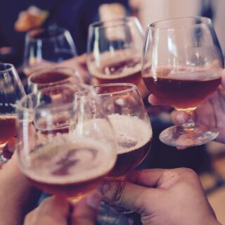 Sundowner: People cheering at a party
