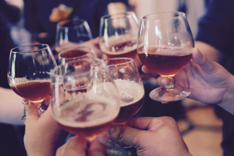 Sundowner: People cheering at a party