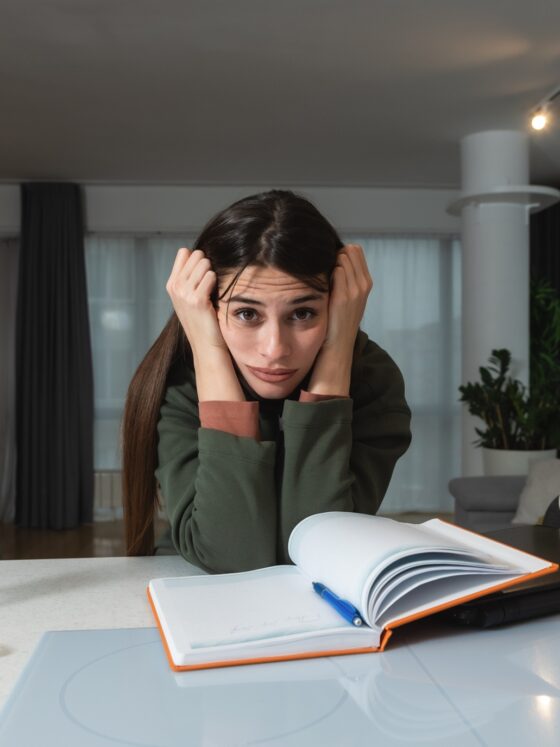 ADHD: Young freelance business finance woman has a problem with attention deficit hyperactivity disorder ADHD she cant start work on project Female lost concentration cant work from home on laptop computer