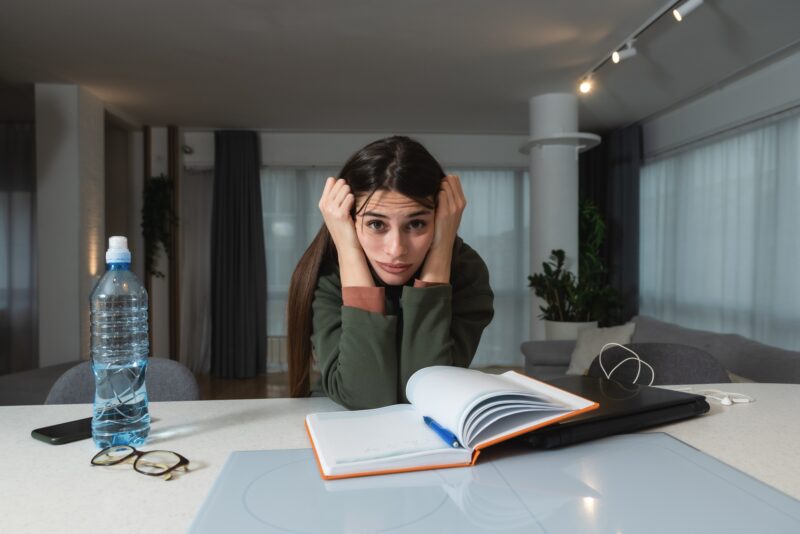 ADHD: Young freelance business finance woman has a problem with attention deficit hyperactivity disorder ADHD she cant start work on project Female lost concentration cant work from home on laptop computer