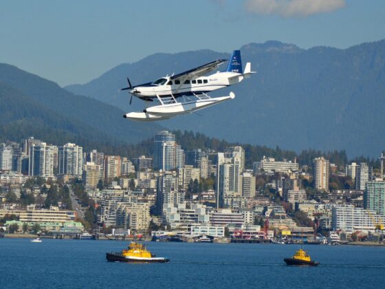 Travel Guide for Gamers: Vancouver skyline with a seaplane in the foreground