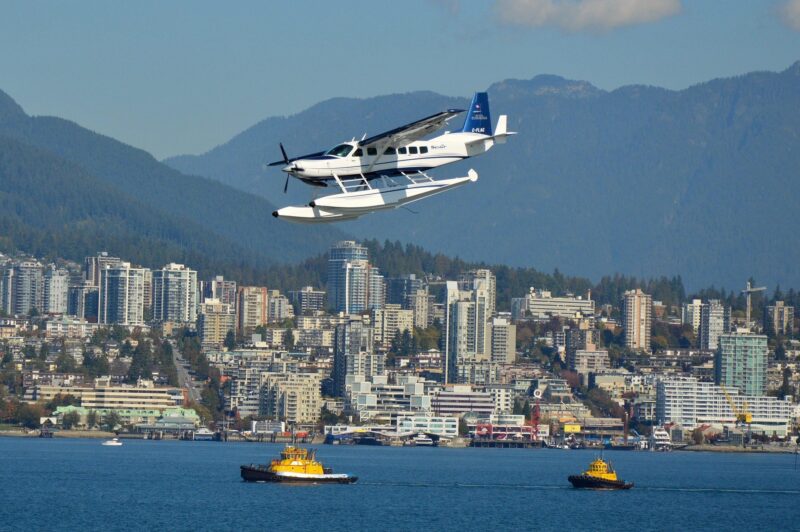 Travel Guide for Gamers: Vancouver skyline with a seaplane in the foreground