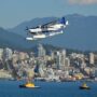Travel Guide for Gamers: Vancouver skyline with a seaplane in the foreground
