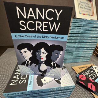 Nancy Screw & The Case of the Dirty Benjamins: Stack of books