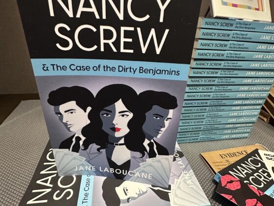 Nancy Screw & The Case of the Dirty Benjamins: Stack of books