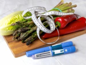 Standard Semaglutide: Ozempic Insulin injection pen for diabetics and weight loss with vegetables and a tape measure