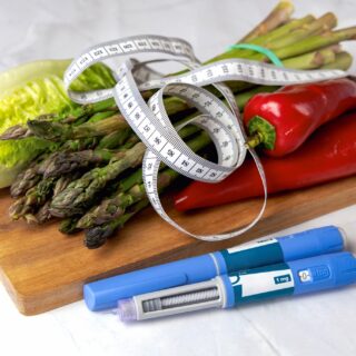 Standard Semaglutide: Ozempic Insulin injection pen for diabetics and weight loss with vegetables and a tape measure