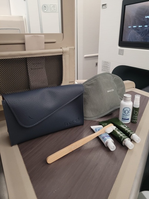 Cathay Pacific Business Class: Amenity kit with the pouch on the airline tray