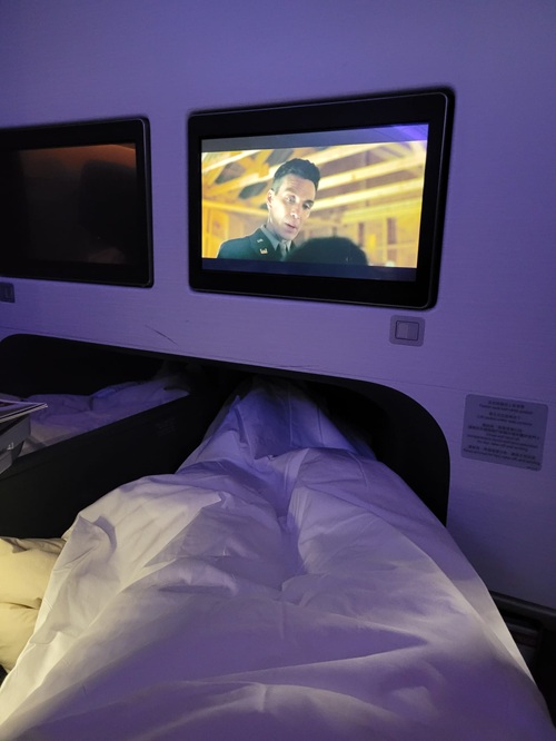 Cathay Pacific Business Class: Movie on an airplane screen