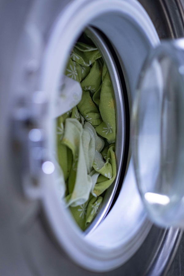 Common Washer Problems: Sheets loaded in a washing machine