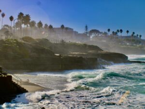 La Jolla: Beach with tide coming in over rocks