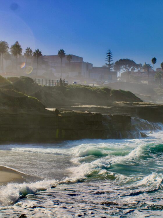 La Jolla: Beach with tide coming in over rocks