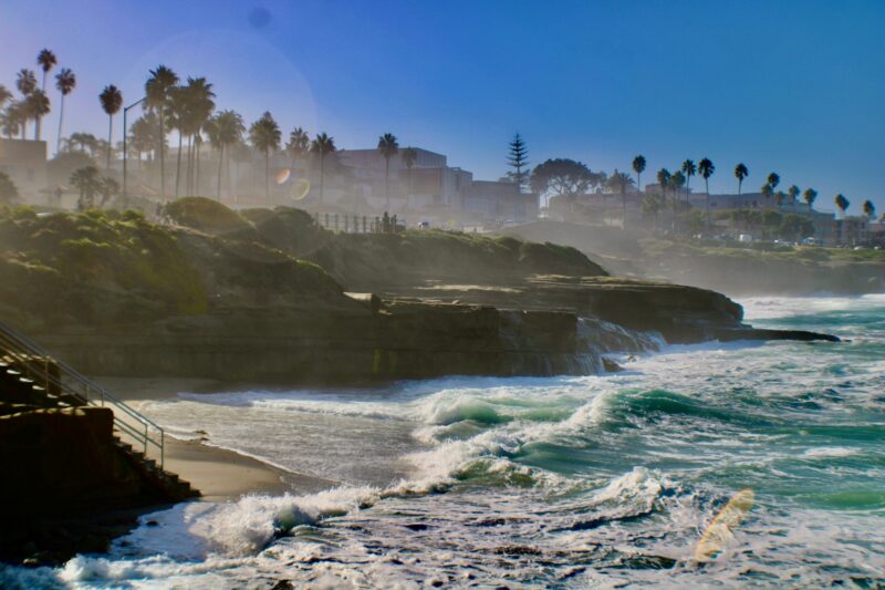 La Jolla: Beach with tide coming in over rocks