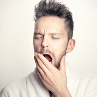 Tired of Feeling Tired: Man Yawning
