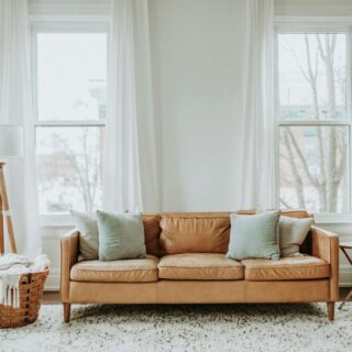 Refresh Your Living Space: Brown Sofa near window in living space