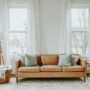 Refresh Your Living Space: Brown Sofa near window in living space
