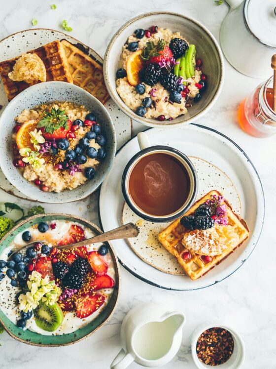Breakfast Spread: oats, waffles, fruit parfaits laid out