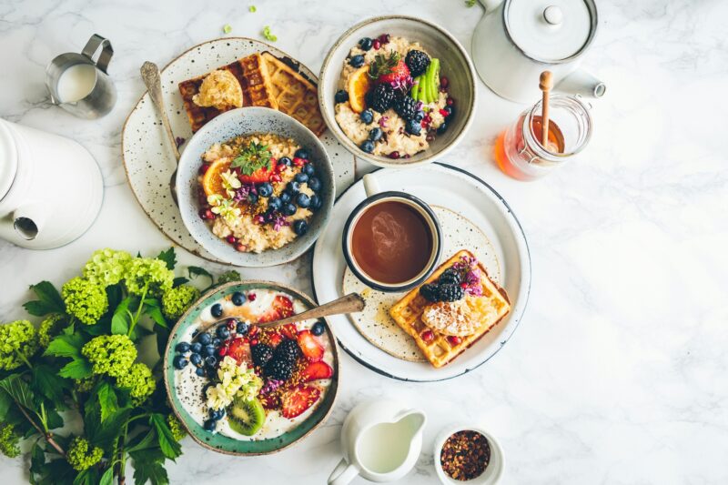 Breakfast Spread: oats, waffles, fruit parfaits laid out